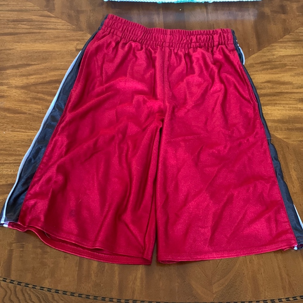 Red boys basketball shorts. Size medium.